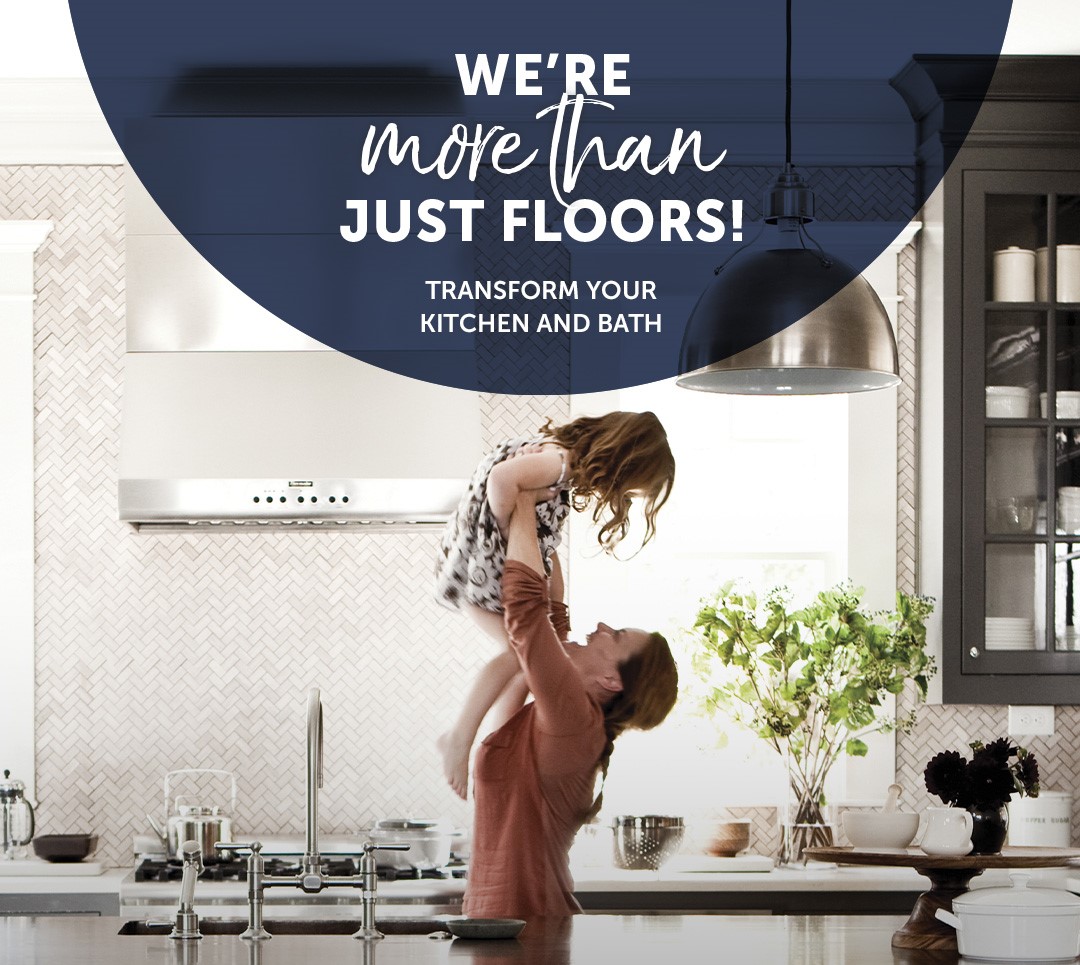 Woman holding child in Newly Remodeled Kitchen